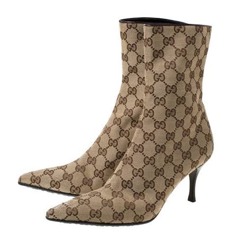 gucci monogram boots price|gucci boots suede.